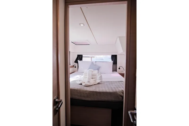 Ruckus Yacht Photos Pics Luxurious bedroom interior of 2021 Fountaine Pajot Elba 45 Catamaran.