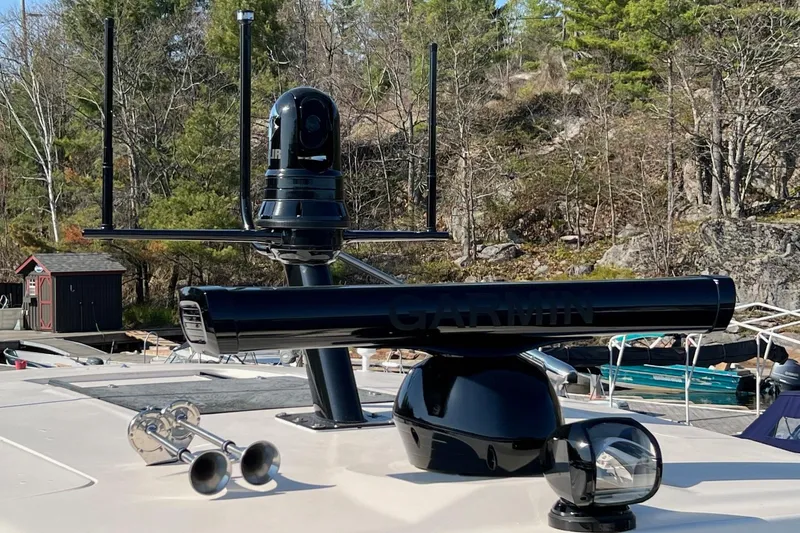  Yacht Photos Pics 2023 Grady-White Canyon 456 boat with advanced Garmin radar and navigation equipment.