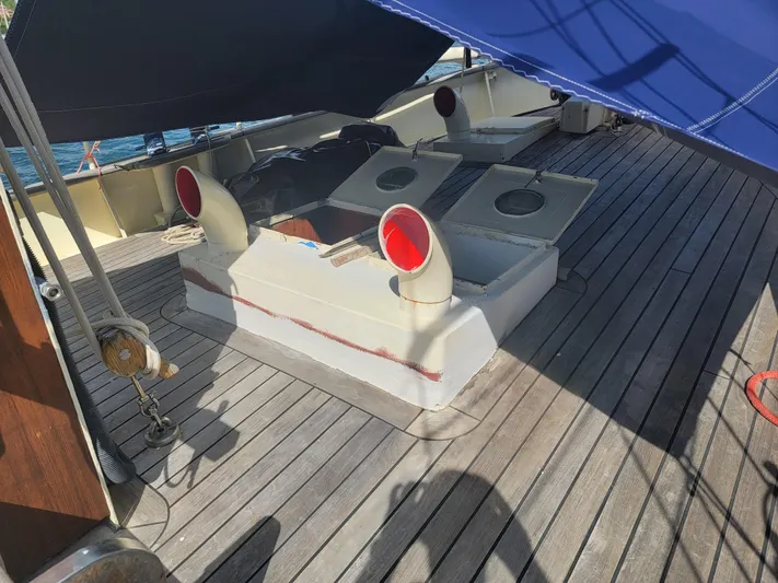 Maisie Rose Yacht Photos Pics 1984 Custom Kuipper NV Holland yacht deck with wooden flooring and ventilation pipes.