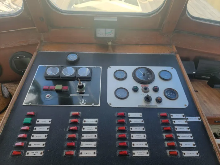 Maisie Rose Yacht Photos Pics Control panel of 1984 Custom Kuipper NV Holland boat with gauges and switches.