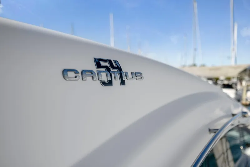 Simply Complicated Yacht Photos Pics 2019 Cruisers Yachts 54 Cantius logo on sleek white hull.