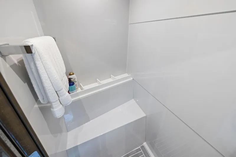 Simply Complicated Yacht Photos Pics Shower area in 2019 Cruisers Yachts 54 Cantius with towels and toiletries.