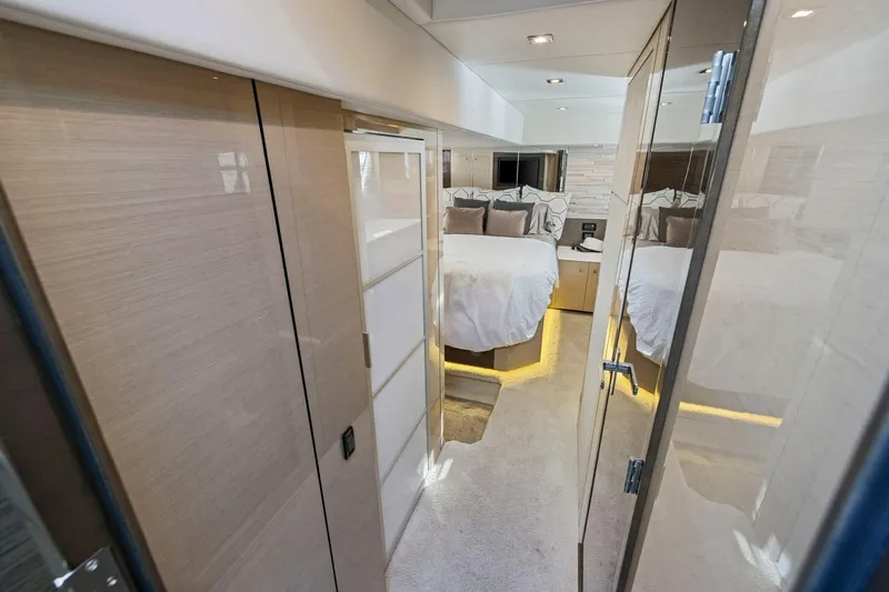Simply Complicated Yacht Photos Pics Luxurious bedroom interior of 2019 Cruisers Yachts 54 Cantius with modern design and ambient lighting.