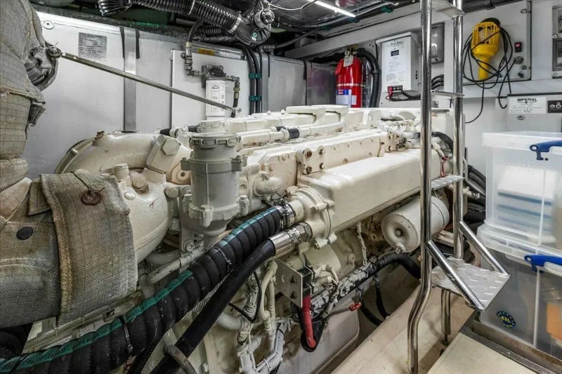 Cheers Yacht Photos Pics Engine room of 2009 Sunseeker Manhattan 52 yacht, featuring complex machinery and equipment.