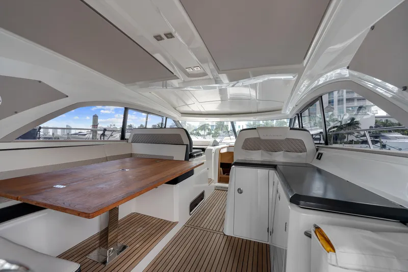 Notre Reve Yacht Photos Pics Interior of 2018 Jeanneau Leader 46 yacht with sleek design and spacious seating area.
