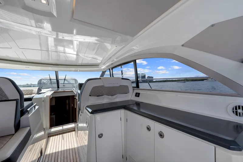 Notre Reve Yacht Photos Pics 2018 Jeanneau Leader 46 yacht interior with sleek design and waterfront view.
