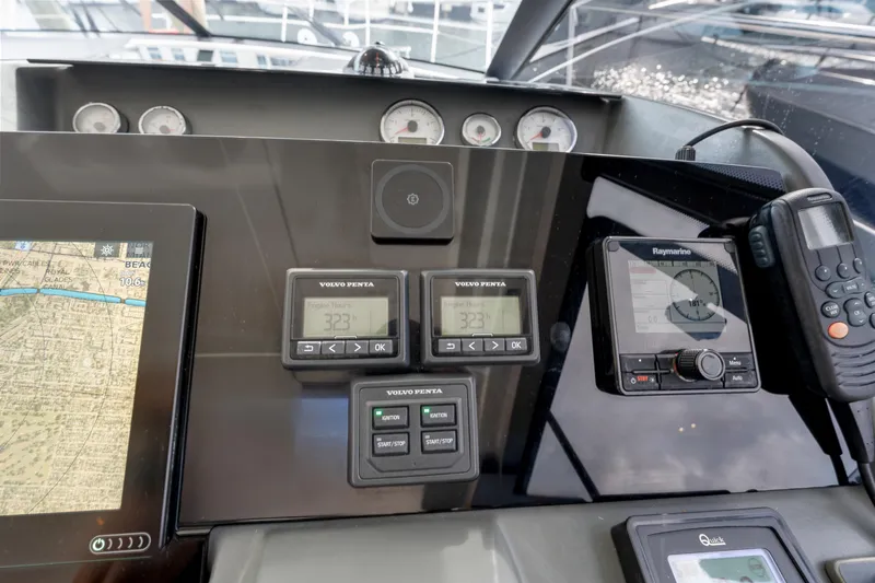 Notre Reve Yacht Photos Pics Control panel of 2018 Jeanneau Leader 46 yacht with navigation and communication devices.