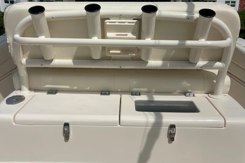  Yacht Photos Pics 2022 Grady-White Canyon 271 boat with rod holders and storage compartments.
