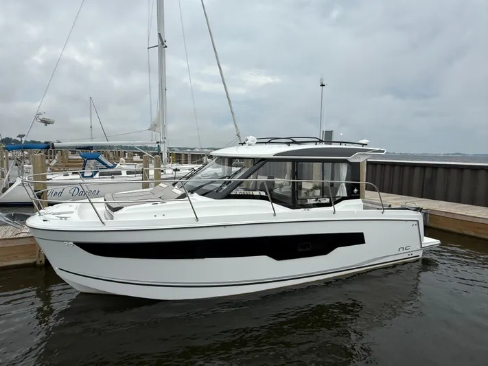  Yacht Photos Pics 2024 Jeanneau NC Weekender 895 Series 2 boat docked at marina.