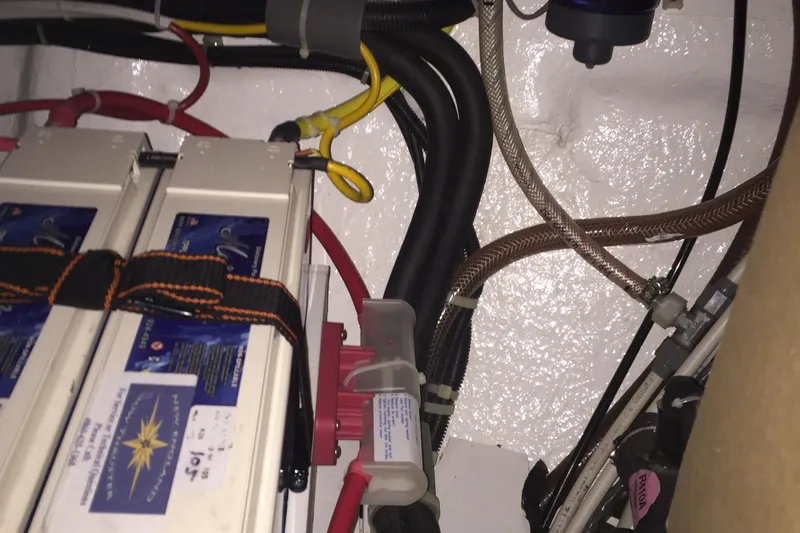 Patience Yacht Photos Pics Battery compartment of a 2012 Hylas 46 yacht with cables and connections.