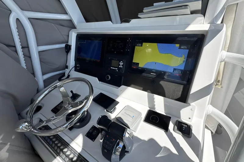 Reel Advice Yacht Photos Pics 2019 Invincible 39 Open Fisherman helm with Garmin navigation displays and controls.