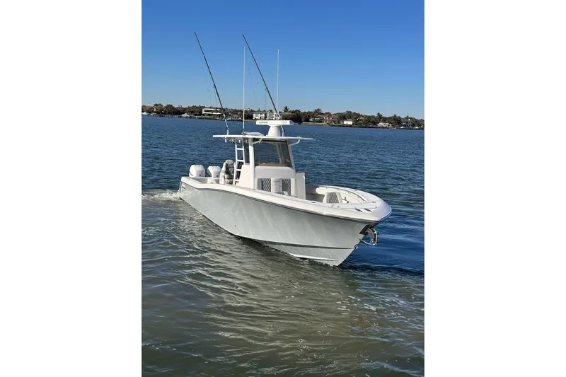 Reel Advice Yacht Photos Pics 2019 Invincible 39 Open Fisherman boat cruising on a sunny day.
