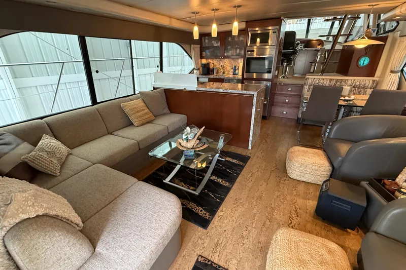  Yacht Photos Pics Luxurious interior of a 1997 Bayliner 5788 Pilot House Motoryacht with modern furnishings.