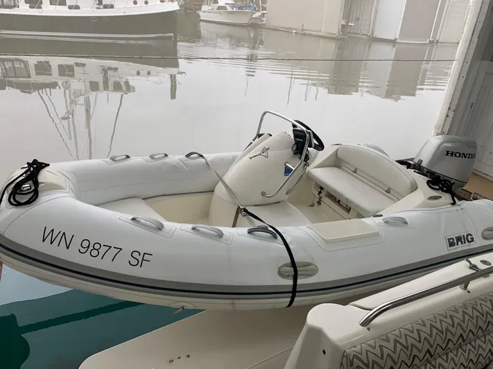  Yacht Photos Pics White inflatable boat with Honda motor docked beside a 1997 Bayliner Pilothouse.