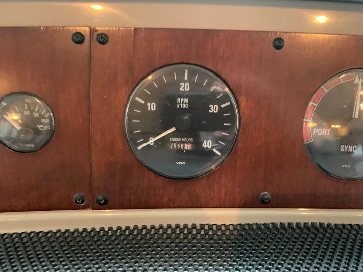  Yacht Photos Pics Dashboard gauges of a 1997 Bayliner Pilothouse boat, featuring RPM and engine hours.