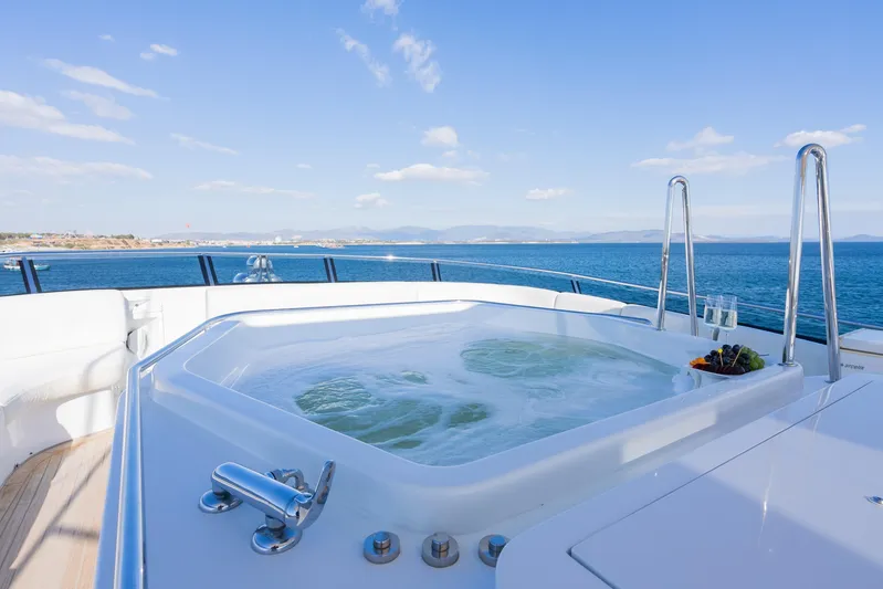 Stella Fiera Yacht Photos Pics Luxurious jacuzzi on 1998 Benetti Classic yacht with ocean view.