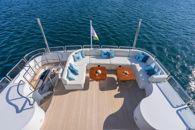 Stella Fiera Yacht Photos Pics Luxurious 1998 Benetti Classic yacht deck with elegant seating and ocean view.