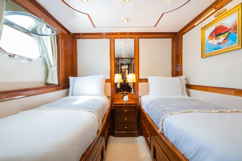 Stella Fiera Yacht Photos Pics Luxurious twin cabin on 1998 Benetti Classic yacht with elegant wood finishes.