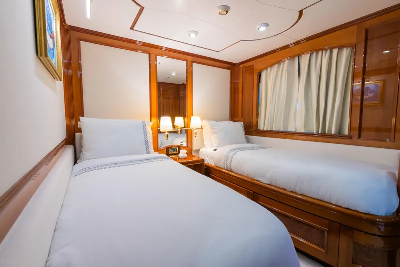 Stella Fiera Yacht Photos Pics Luxurious twin cabin on 1998 Benetti Classic yacht with elegant wood finishes.