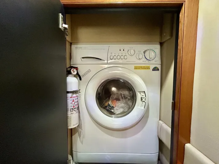  Yacht Photos Pics Washing machine and fire extinguisher in 2005 Cruisers Yachts 455 Express Motor Yacht.