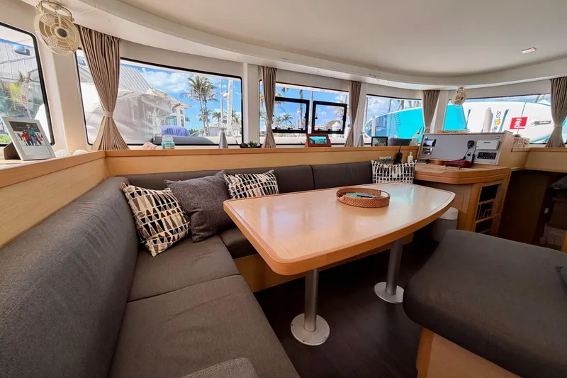 Island Hopp'r Owners Version Yacht Photos Pics Interior of 2017 Lagoon 42 catamaran with cozy seating and modern decor.