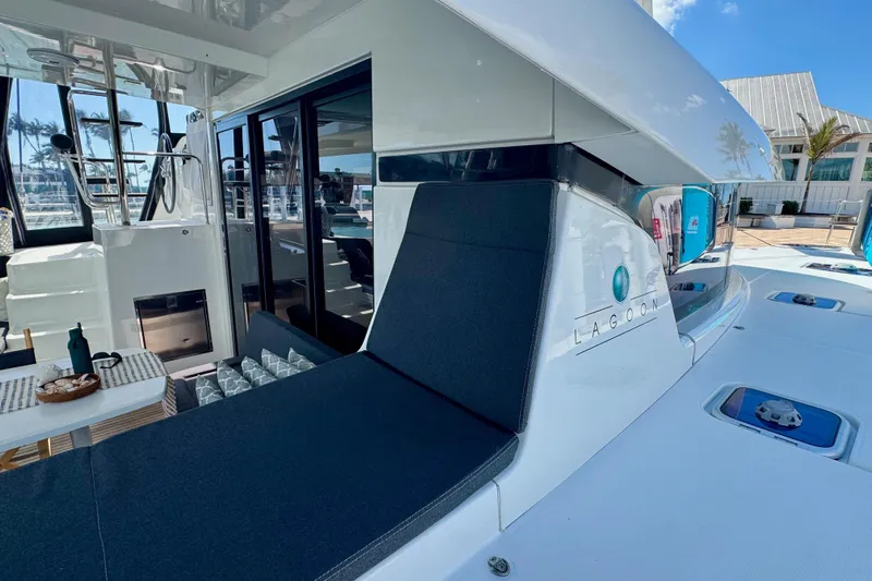 Island Hopp'r Owners Version Yacht Photos Pics 2017 Lagoon 42 catamaran with sleek design, outdoor seating, and modern amenities.