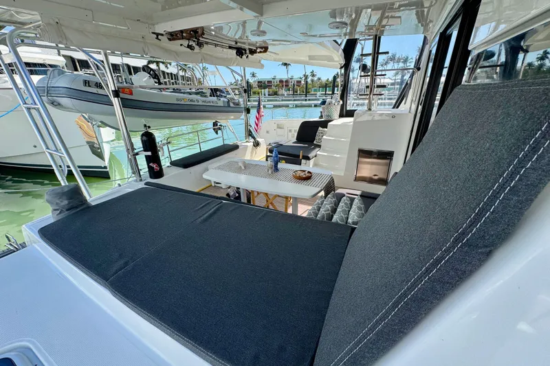 Island Hopp'r Owners Version Yacht Photos Pics Luxurious 2017 Lagoon 42 catamaran with spacious deck and comfortable seating area.