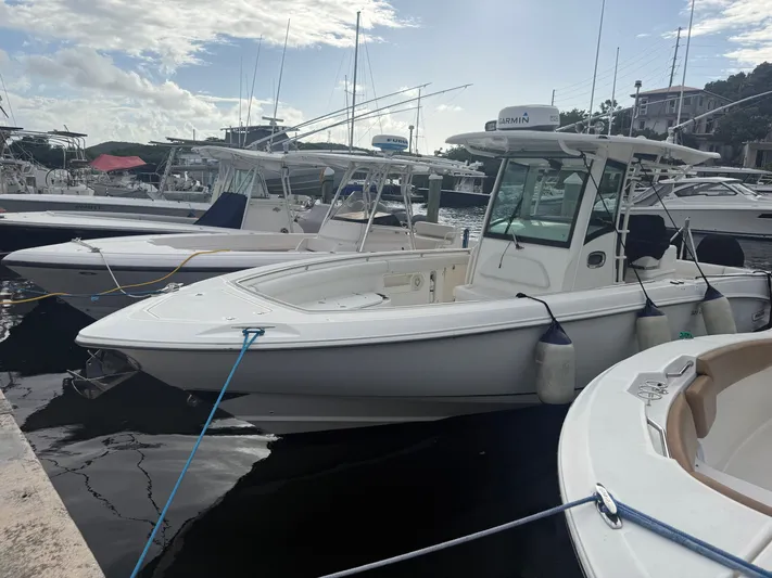 Loretta II Yacht Photos Pics 2012 Boston Whaler 320 Outrage docked at marina.