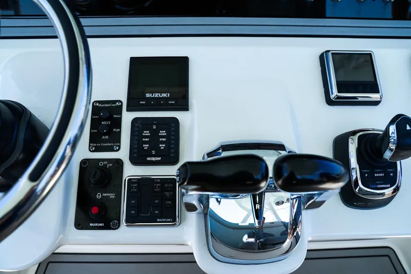  Yacht Photos Pics 2021 Sea Pro 320 DLX Offshore boat controls with Suzuki display and joystick.