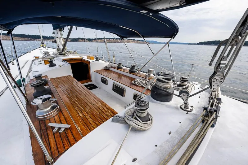 Koh - I - Noor Yacht Photos Pics 1974 C&C 61 sailboat deck with wooden accents and ocean view.