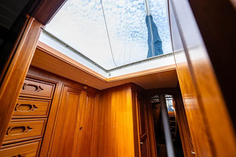 Koh - I - Noor Yacht Photos Pics Interior of 1974 C&C 61 sailboat with wooden cabinetry and skylight.