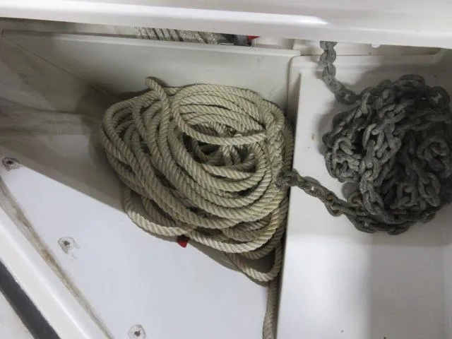  Yacht Photos Pics Coiled rope and chain in storage compartment of 2003 Legacy Yachts 34 Sedan.