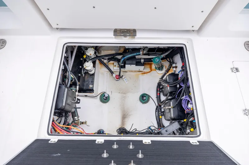  Yacht Photos Pics Engine compartment of 2022 Sea Fox 368 Commander boat, showcasing wiring and components.