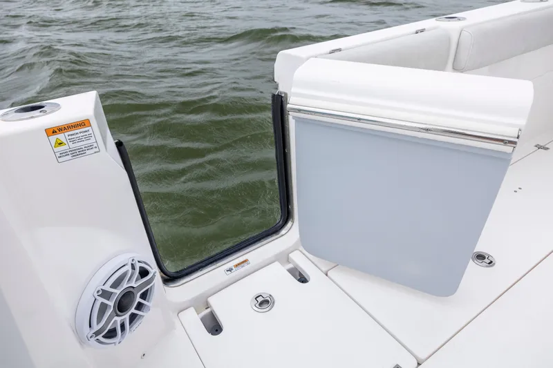  Yacht Photos Pics 2022 Sea Fox 368 Commander boat with open side door and speaker, on water.