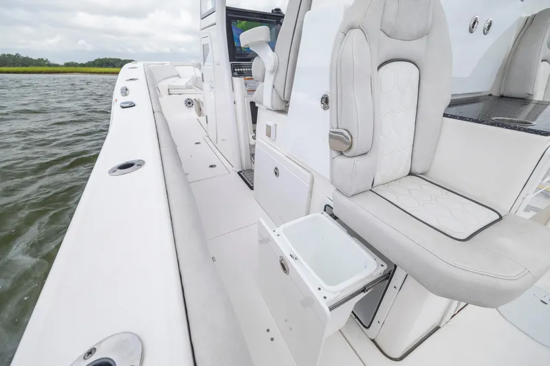  Yacht Photos Pics 2022 Sea Fox 368 Commander boat interior with luxurious seating and storage on the water.