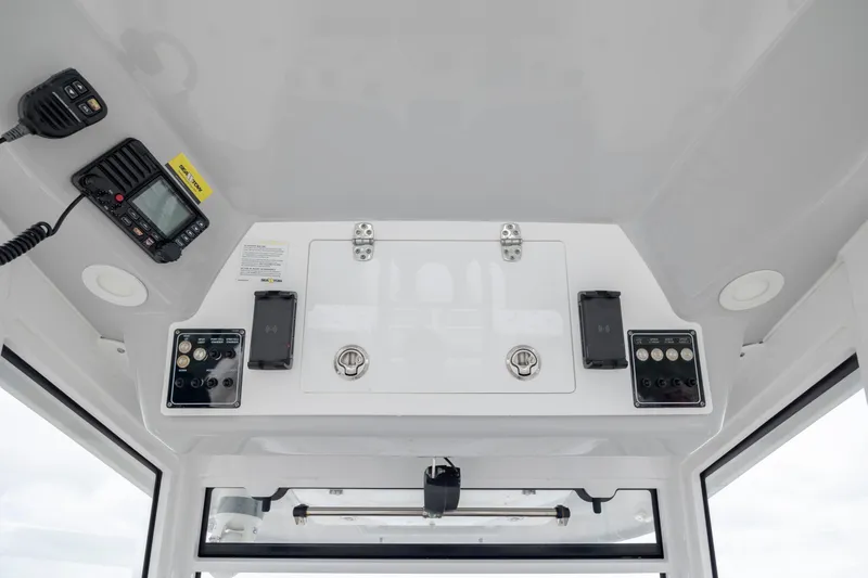  Yacht Photos Pics 2022 Sea Fox 368 Commander boat console with communication and control panels.