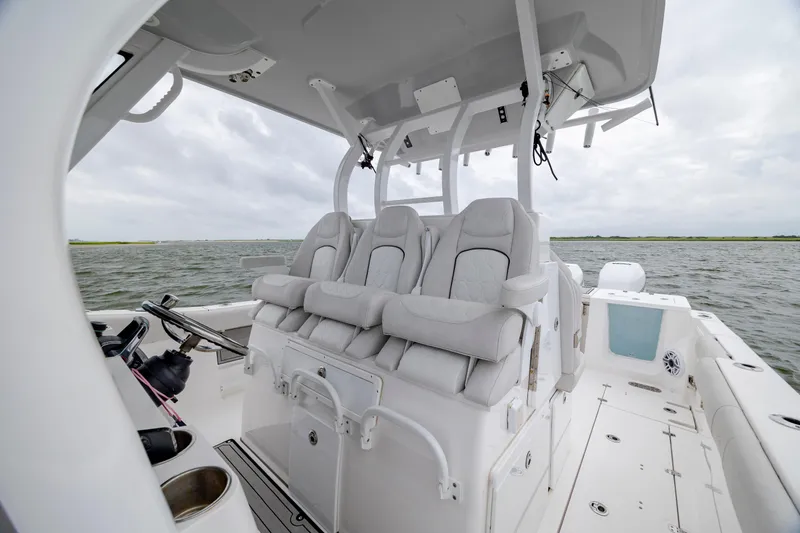  Yacht Photos Pics 2022 Sea Fox 368 Commander boat interior with luxurious seating on open water.