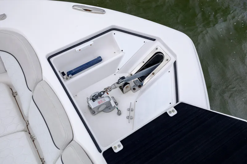  Yacht Photos Pics 2022 Sea Fox 368 Commander anchor compartment with seating, on calm water.