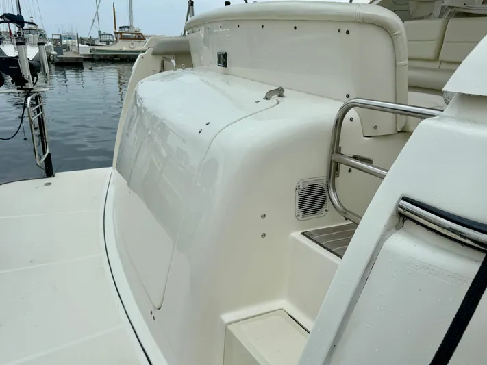  Yacht Photos Pics 2004 Tiara Yachts 4000 Express at marina, showcasing sleek design and spacious deck.