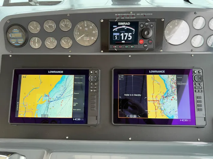  Yacht Photos Pics Dashboard of a 2004 Tiara Yachts 4000 Express with navigation displays and gauges.