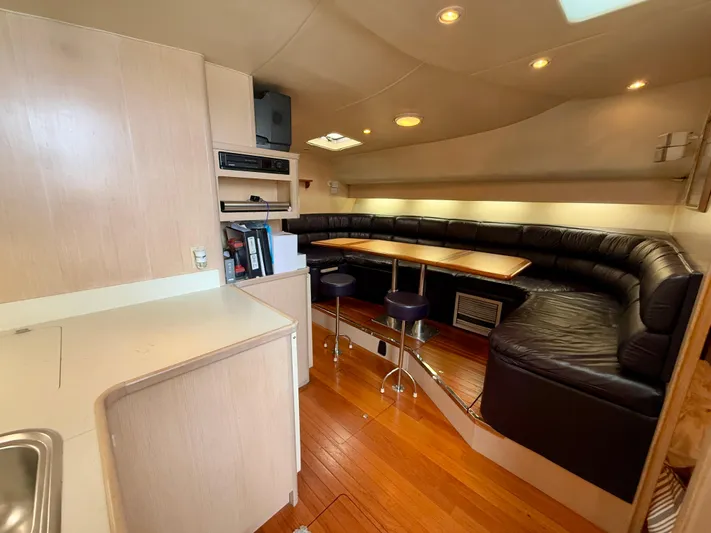  Yacht Photos Pics Luxurious 2004 Tiara Yachts 4000 Express interior with leather seating and modern amenities.