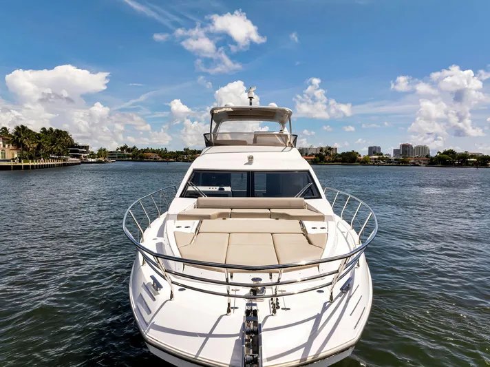  Yacht Photos Pics Azimut Fly 60 yacht, 2022 model, cruising on a sunny day with clear skies.