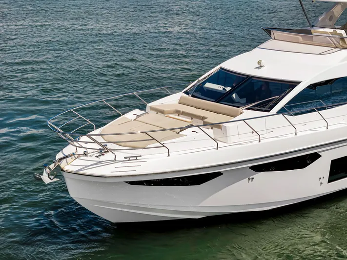  Yacht Photos Pics Azimut Fly 60 yacht, 2022 model, cruising on calm waters.