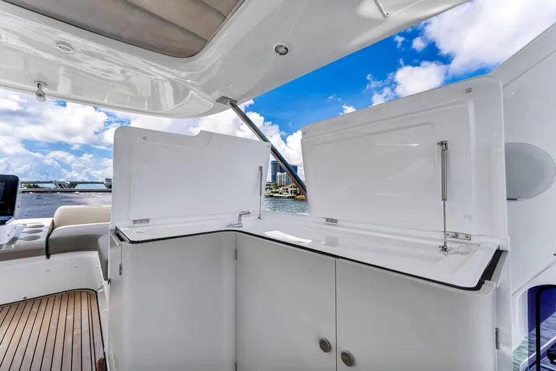  Yacht Photos Pics Luxurious Azimut Fly 60 yacht interior, featuring sleek cabinetry and stunning ocean views.