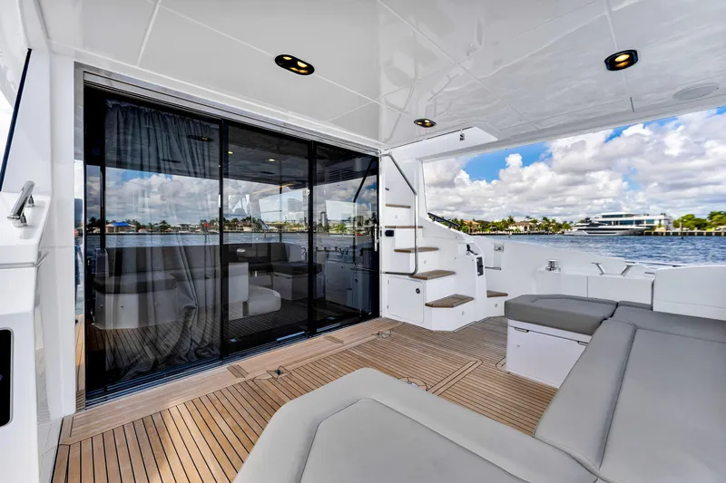  Yacht Photos Pics Luxurious 2022 Azimut Fly 60 yacht interior with modern design and waterfront view.
