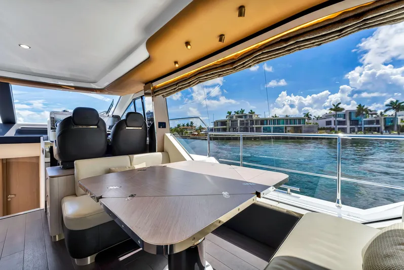  Yacht Photos Pics Interior of 2022 Azimut Fly 60 yacht with waterfront view and modern seating.