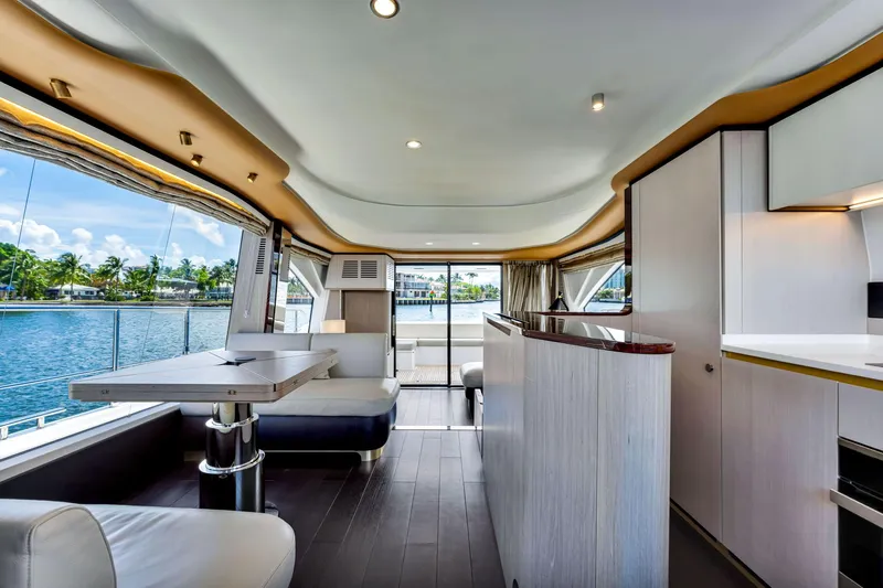  Yacht Photos Pics Luxurious interior of 2022 Azimut Fly 60 yacht with scenic water views.