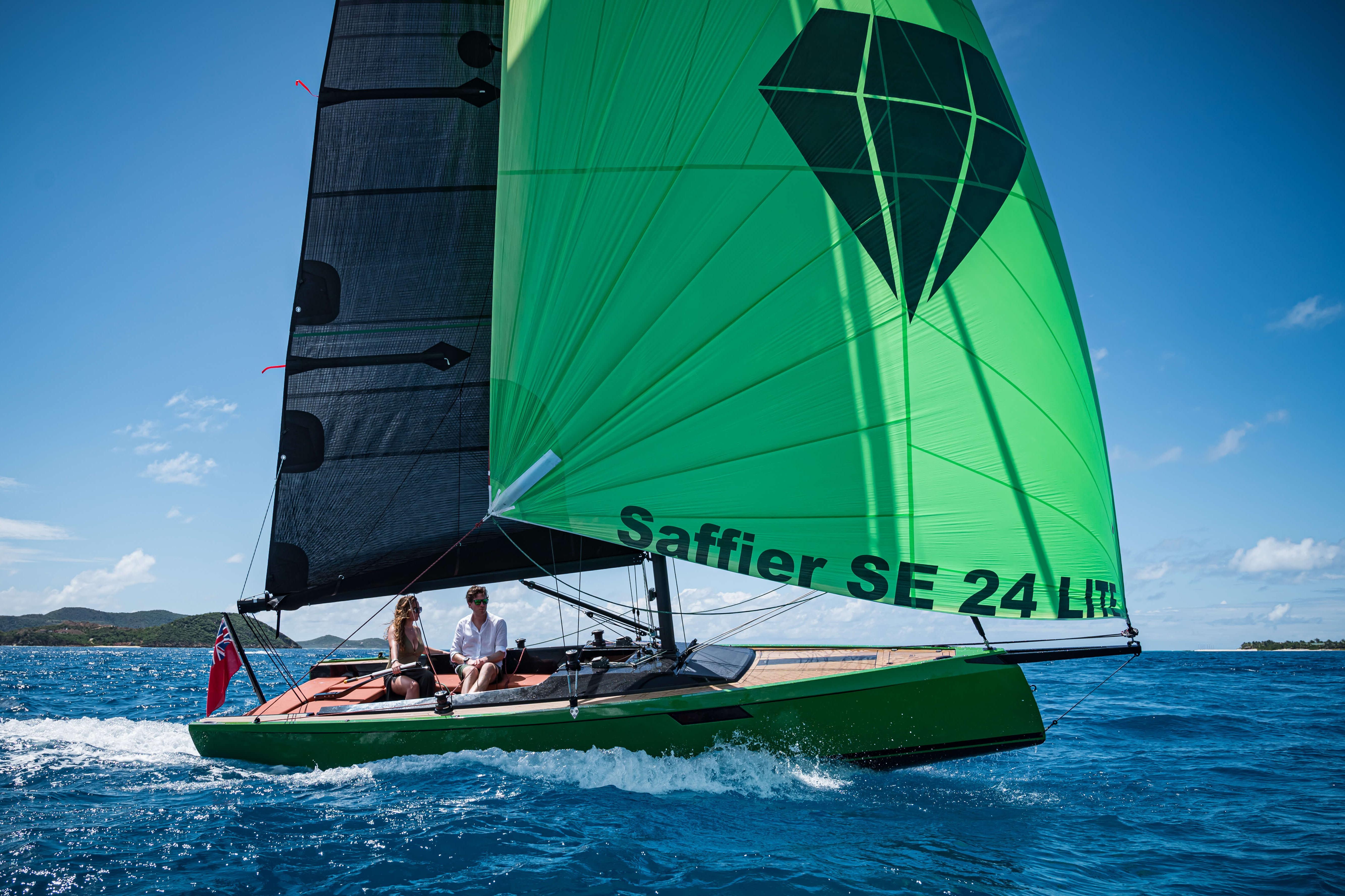 2026 Saffier SE24 Lite sailboat with green sail on open water.