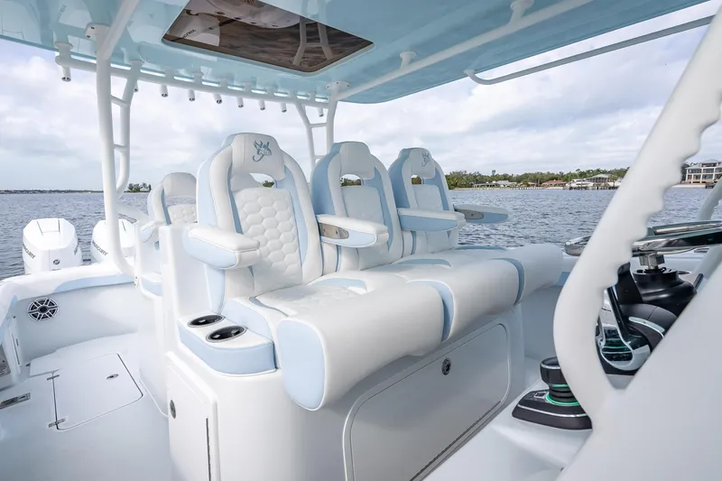 New Stock 42 Offshore Yacht Photos Pics 2026 Yellowfin 42 Offshore boat interior with luxurious seating and modern design.