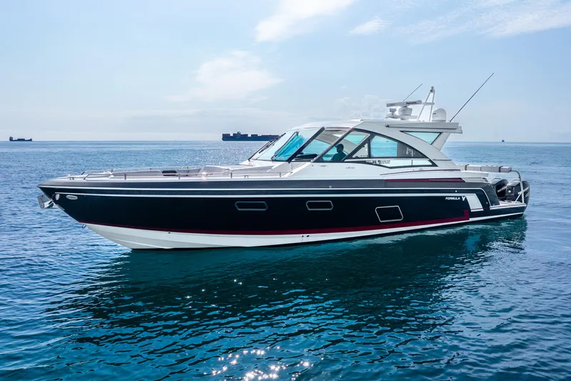  Yacht Photos Pics 2017 Formula 430 All Sport Crossover yacht on calm blue water.